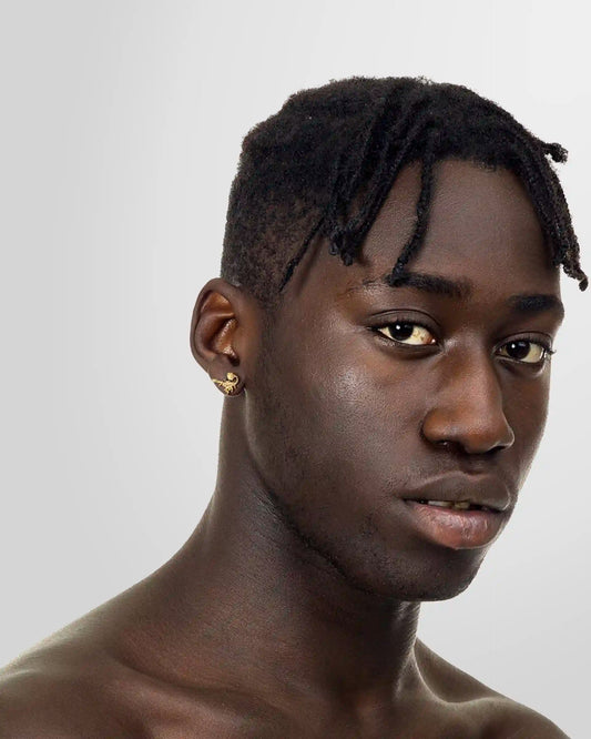 Model wearing Alan Crocetti Hybrid Stud Earring in gold vermeil finish.