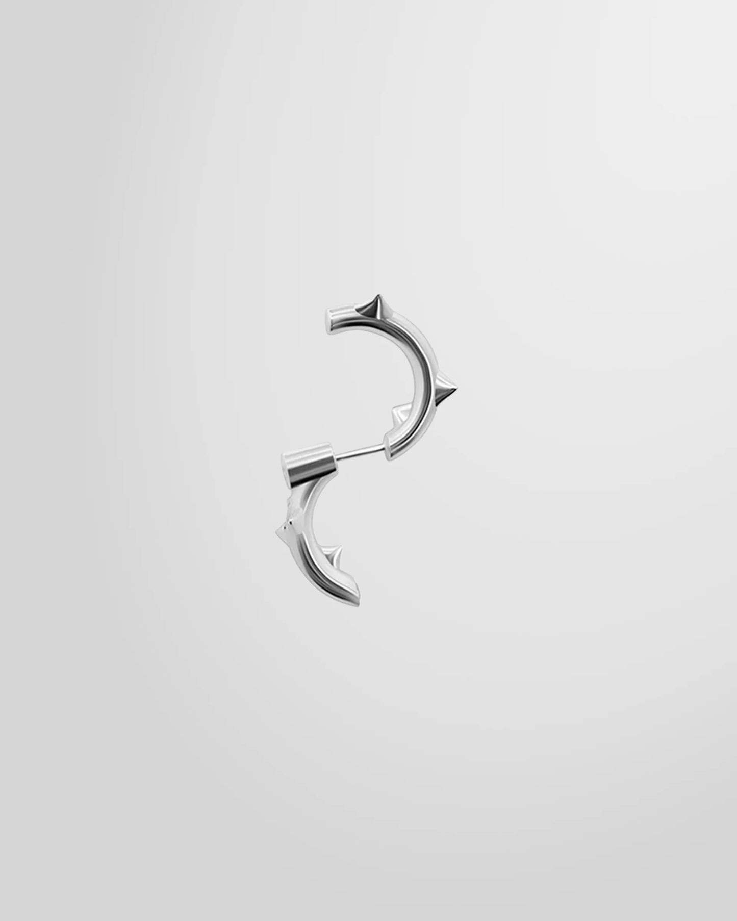 Back view of the Alan Crocetti Peekaboo Thorn Earring in silver revealing the hidden clear zirconia.