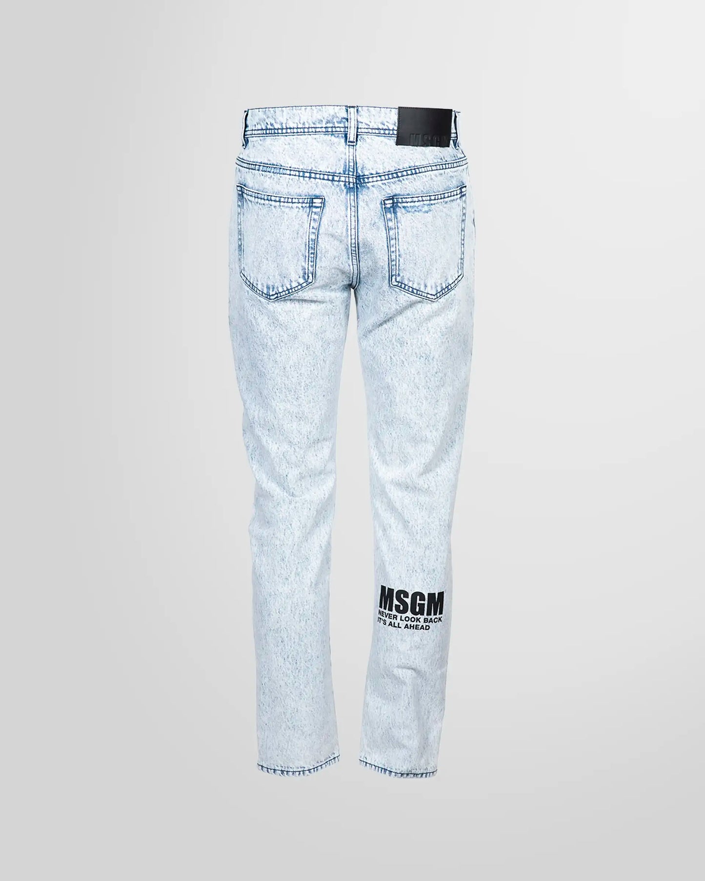 Back view of the MSGM jeans, showing the pocket placement and the subtle logo print.