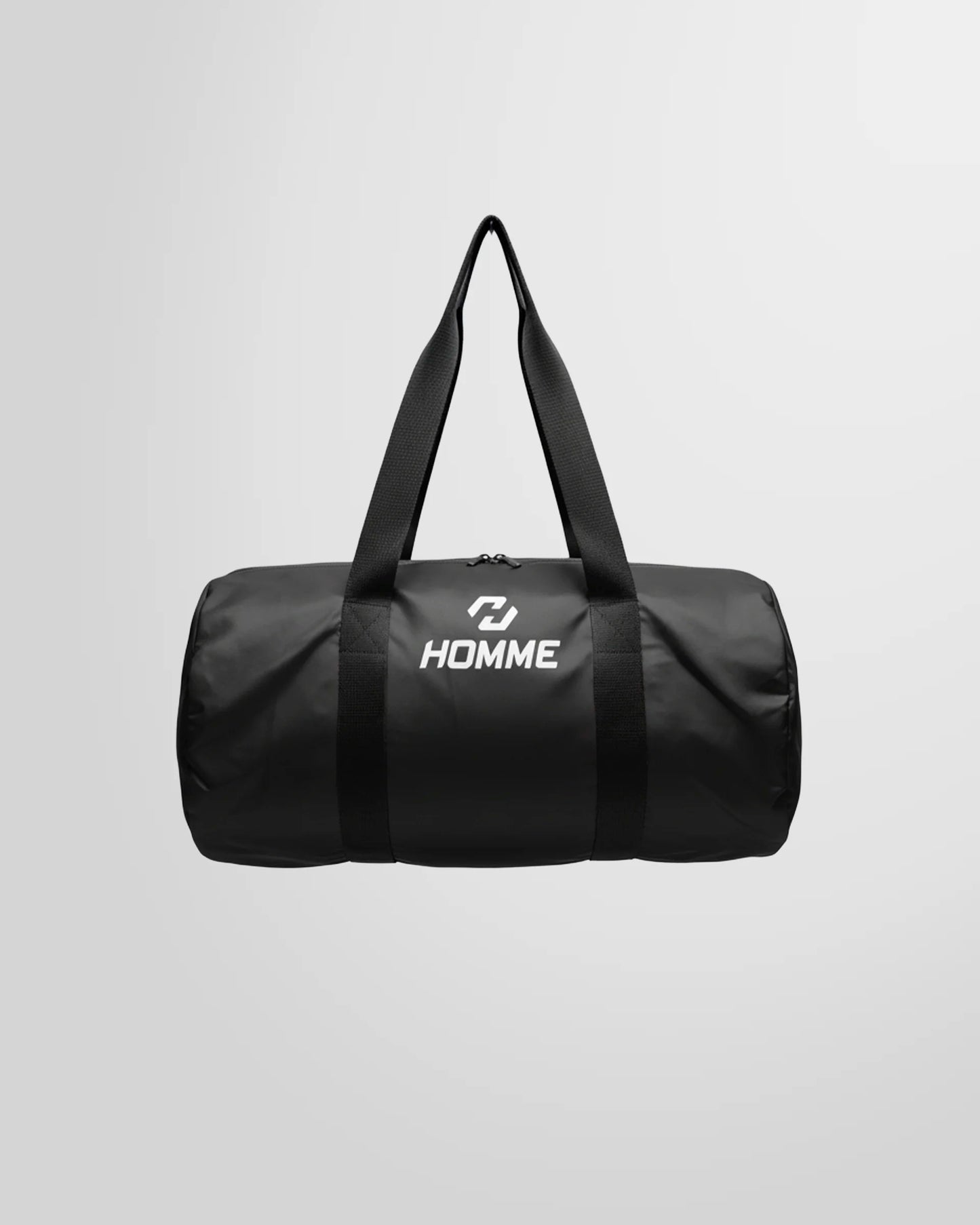 Full studio view of the Not Guilty Homme lightweight sport bag in black, showcasing its high-contrast white logo.