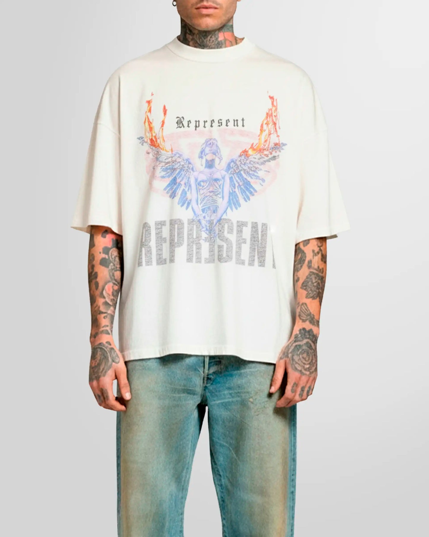 Inside front view of the Represent Reversible Living Legacy Tour T‑Shirt in Flat White on a model