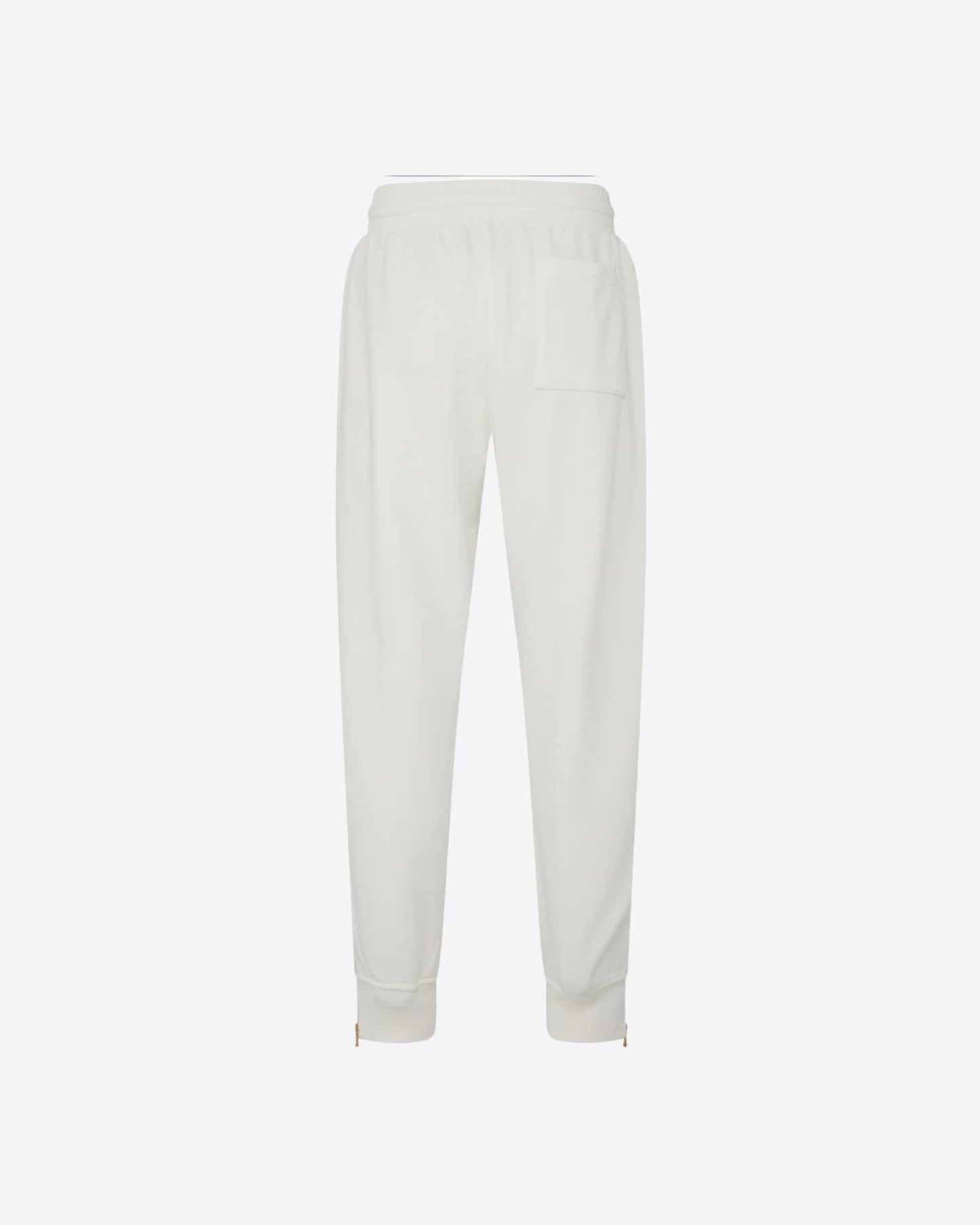 Pantalón de chándal con cremallera en el dobladillo