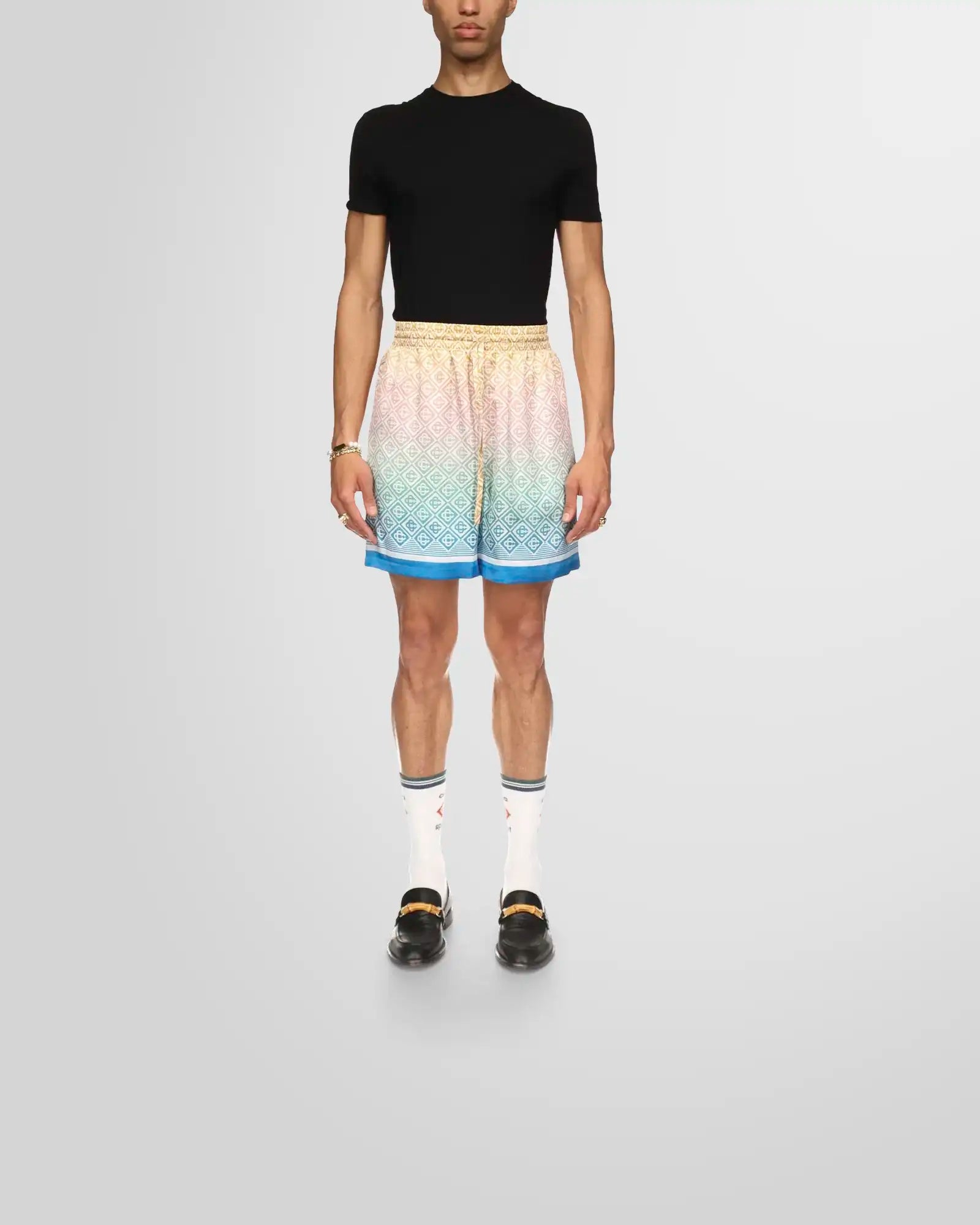 Model wearing Casablanca Gradient Monogram Multicolor Silk Shorts 