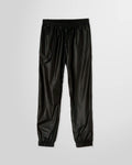 MSGM Black Nylon Track Pants with elastic waistband, side pockets, and logo patch on the rear pocket.