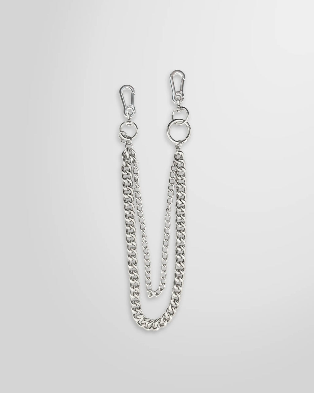 Not Guilty Homme layered dual curb chain accessory with two separate clasps on white background.