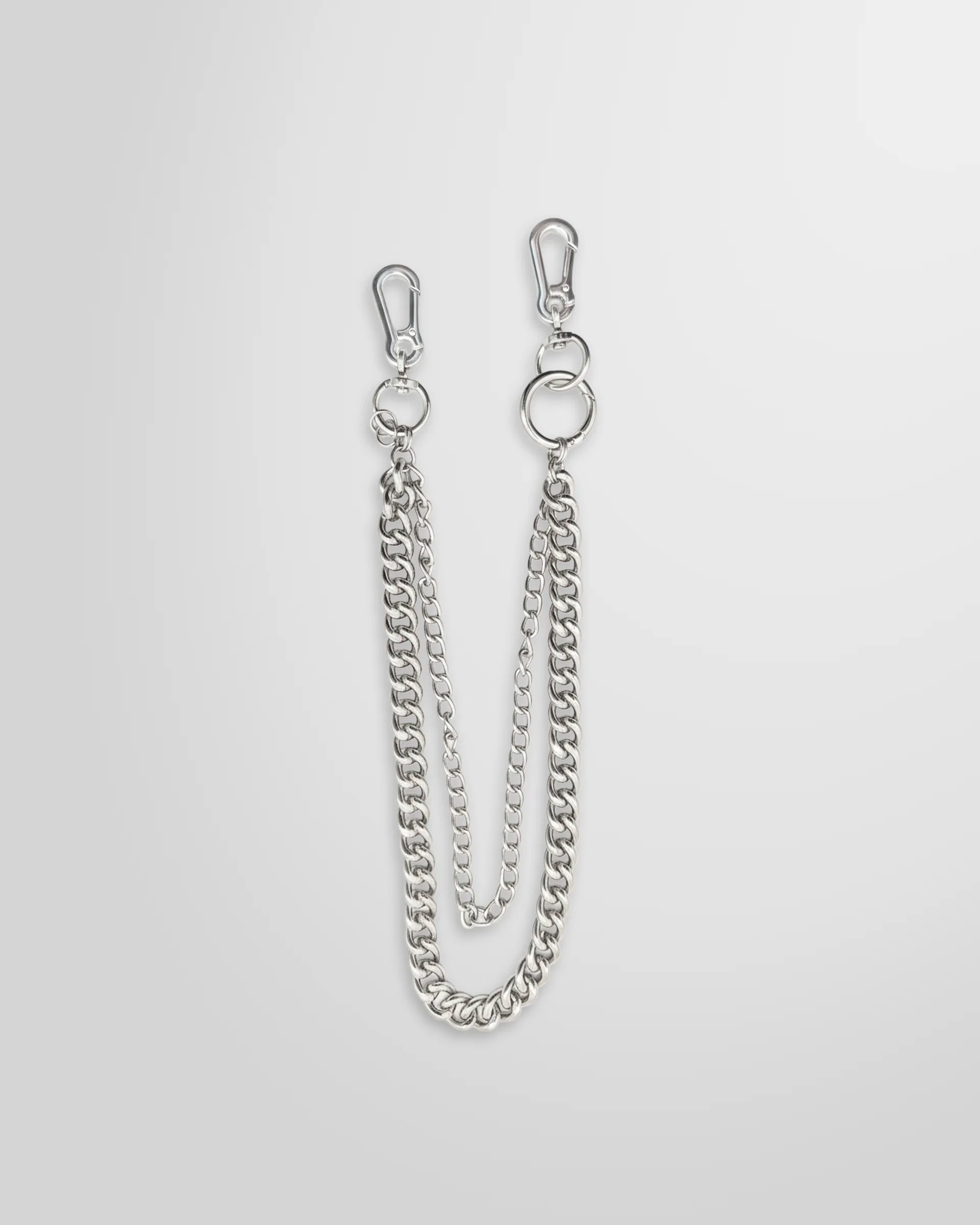 Not Guilty Homme layered dual curb chain accessory with two separate clasps on white background.