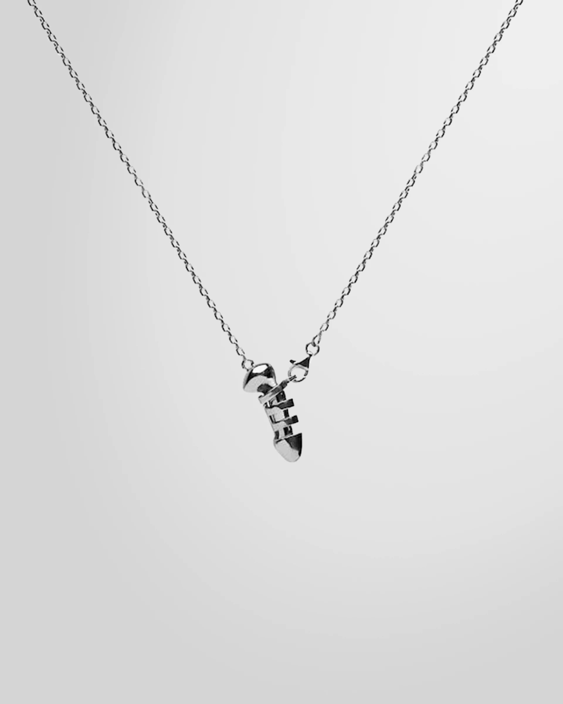 Alan Crocetti Chastity Necklace in rhodium-plated silver, showing the chain link design and pendant.