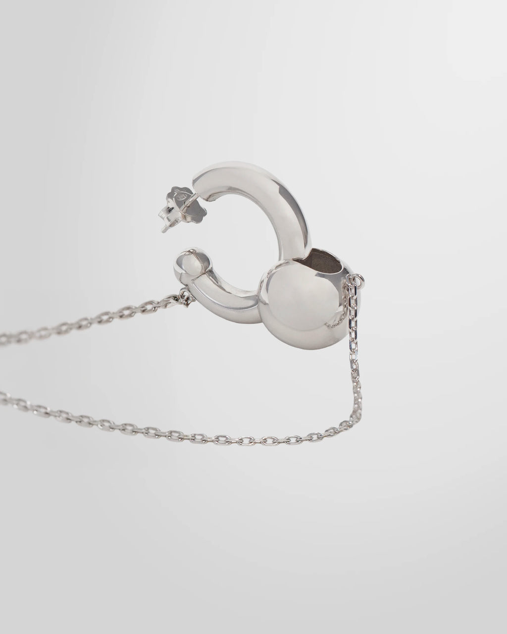 Angle view of the Alan Crocetti Mood Ear Set in silver with rhodium finish.