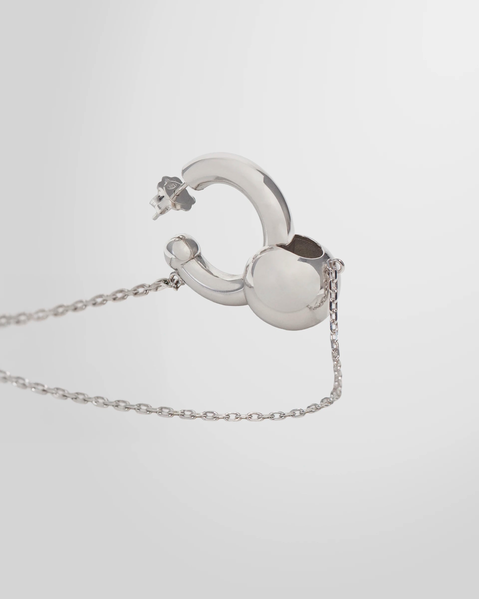 Angle view of the Alan Crocetti Mood Ear Set in silver with rhodium finish.