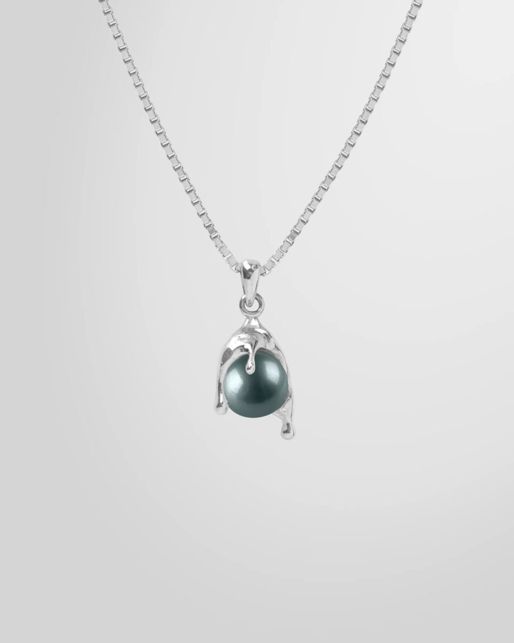 Alan Crocetti Nano Black Pearl Melt Necklace in rhodium-plated silver, main view showing the black pearl and melt design.
