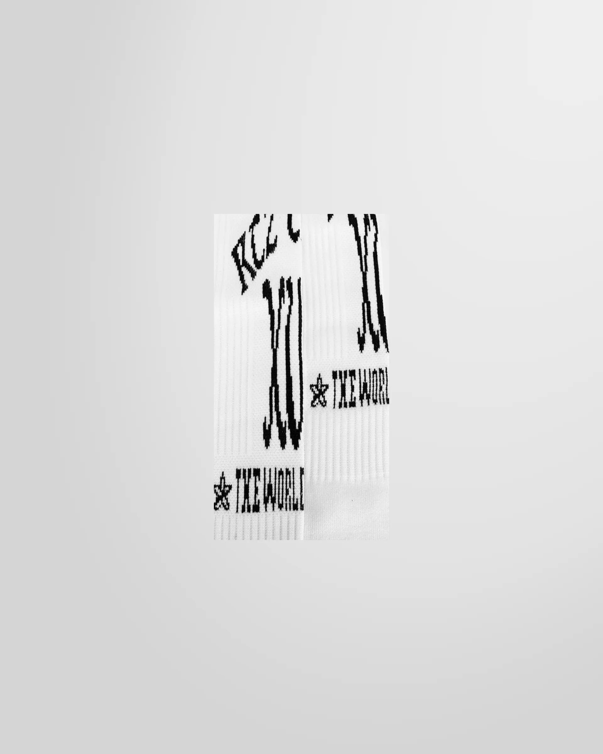 Detail of the graphic artwork in front of the KTZ logo print socks in white.