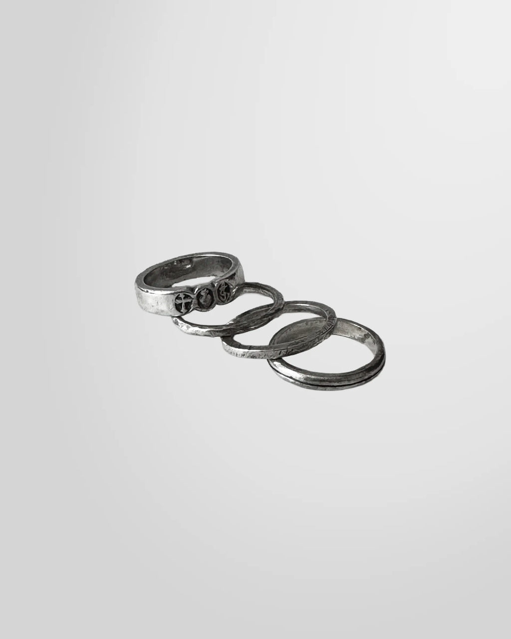 A view of the four silver stacking rings from Goti is shown here.