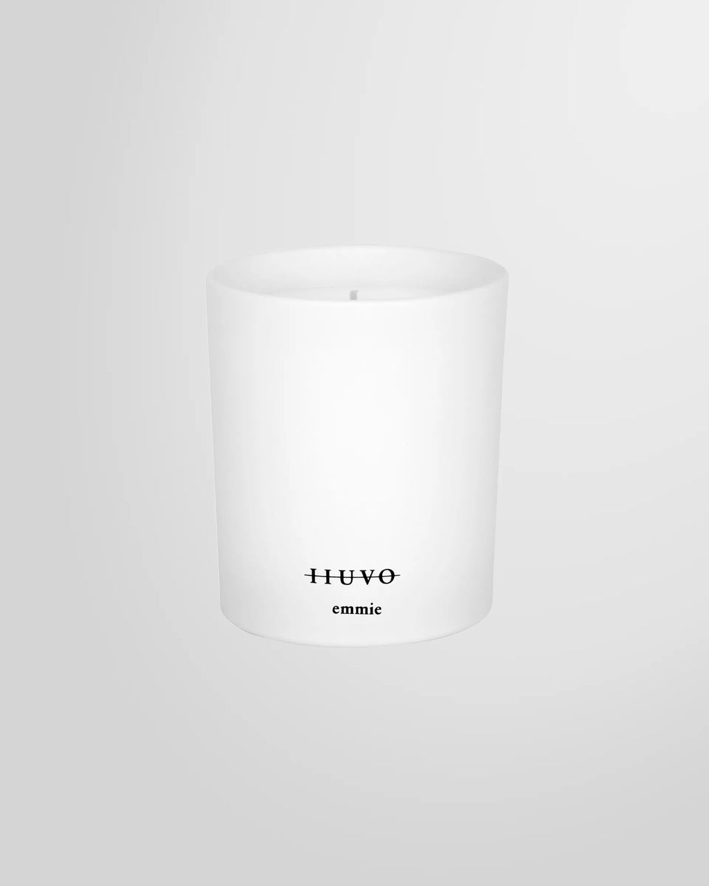Front view of the IIUVO scented candle with label, product shot.