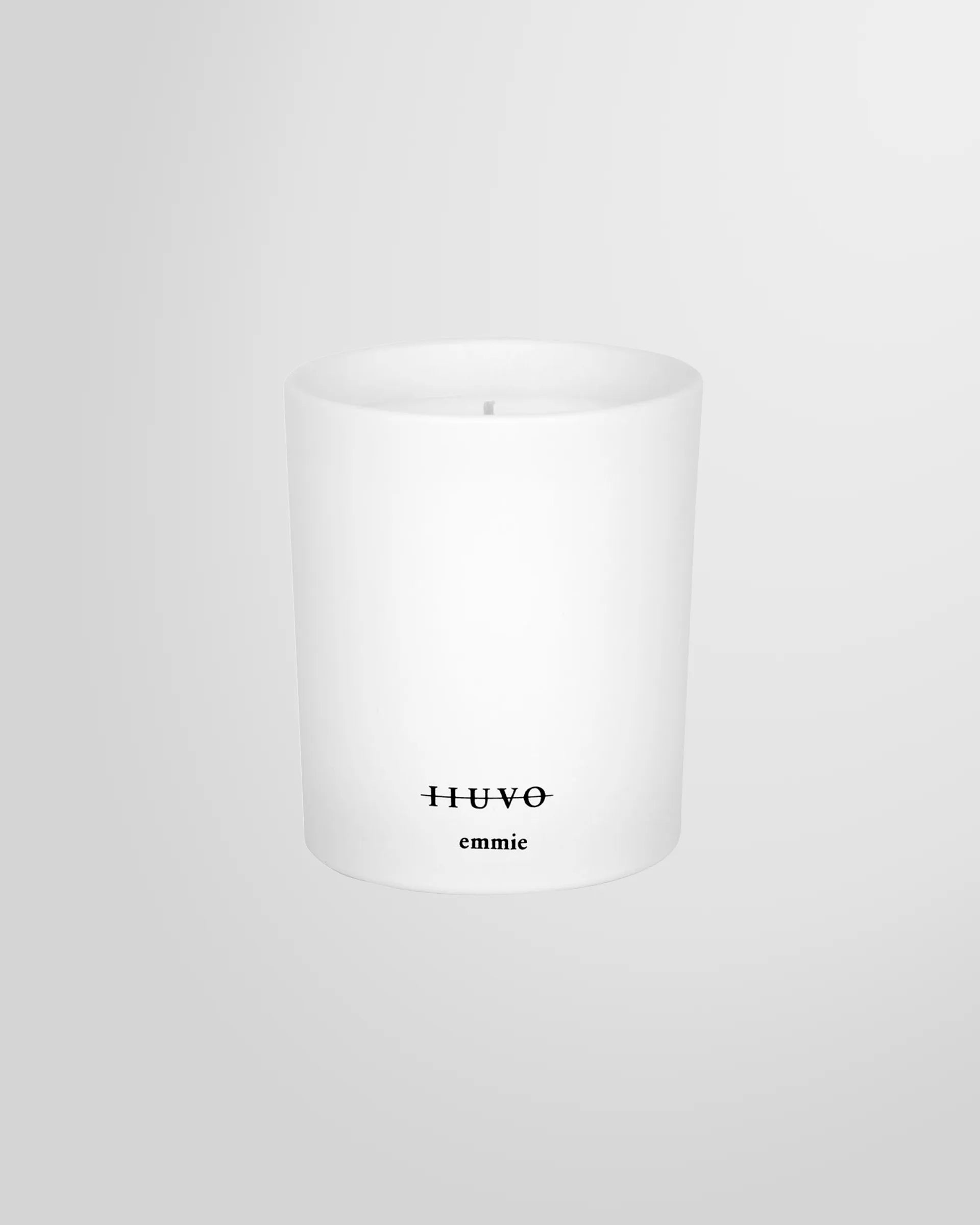 Front view of the IIUVO scented candle with label, product shot.