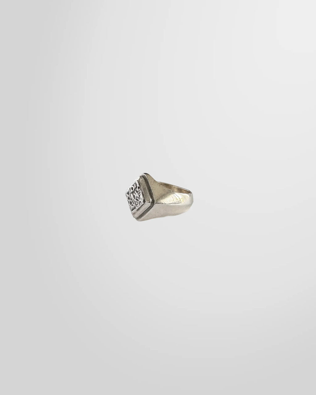 Side profile of the Johnny Ramli Carved Signet Ring in sterling silver.