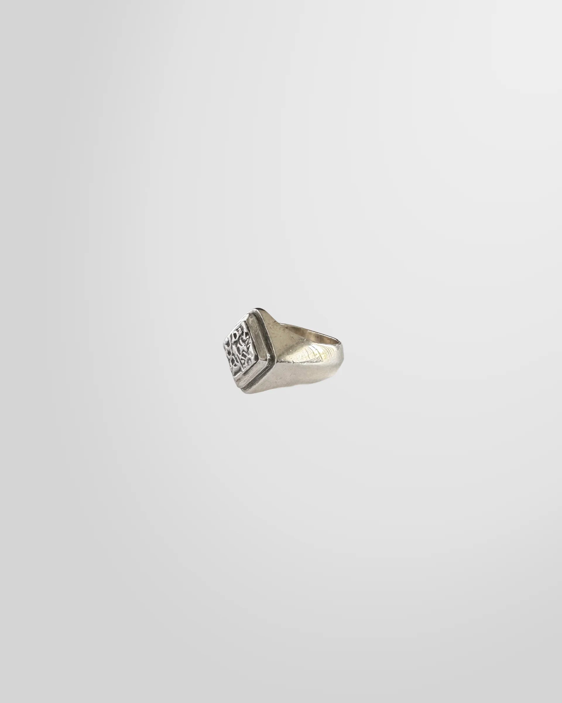 Side profile of the Johnny Ramli Carved Signet Ring in sterling silver.