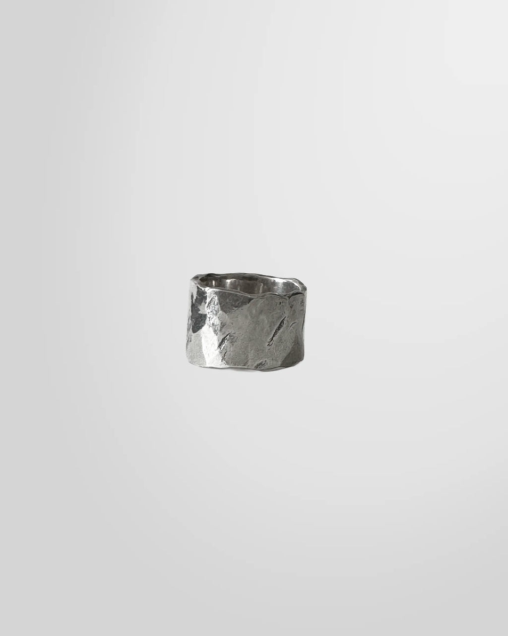 View from the side of the handcrafted Johnny Ramli Forged Band Ring.