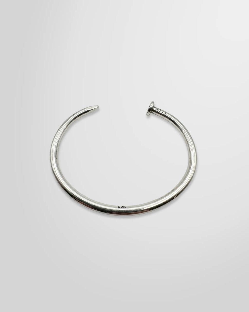 Johnny Ramli Nail Cuff Sterling Silver 925 – front profile on grey background
