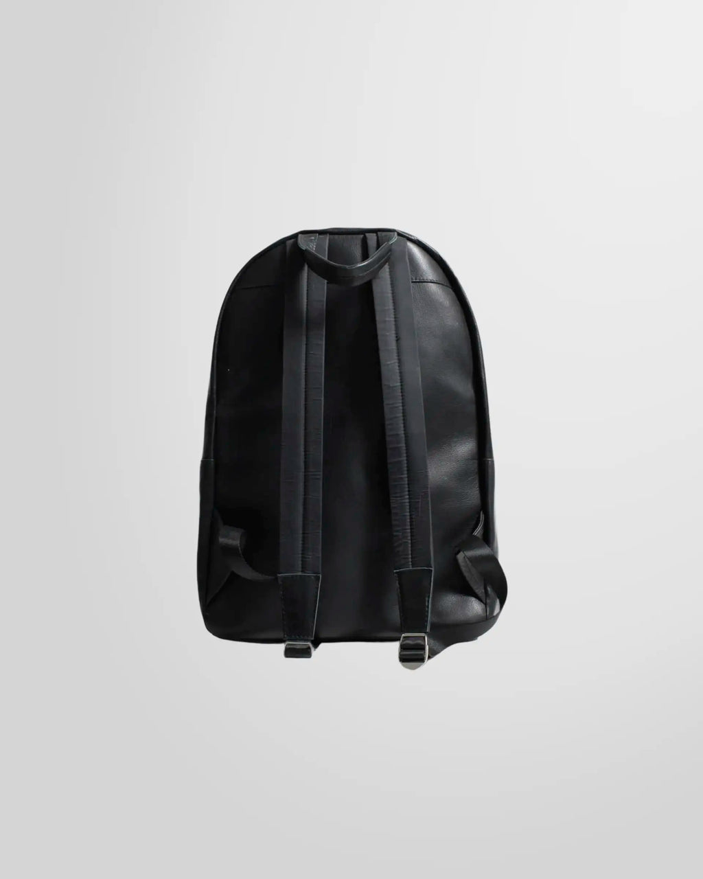Side and back profile of the Johnny Ramli nappa leather backpack.