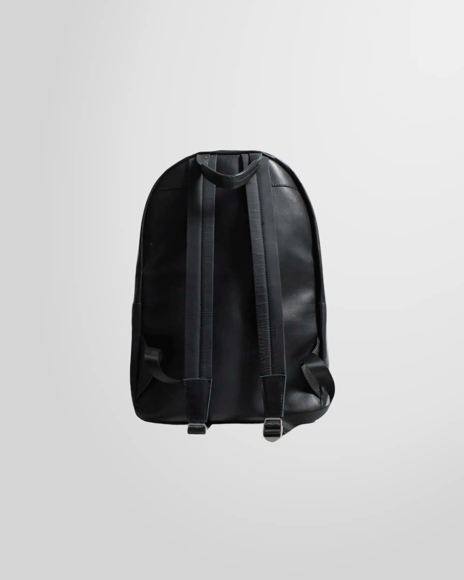 Side and back profile of the Johnny Ramli nappa leather backpack.