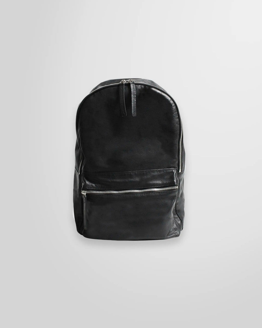 Front view of the Johnny Ramli minimalist backpack in black nappa leather.