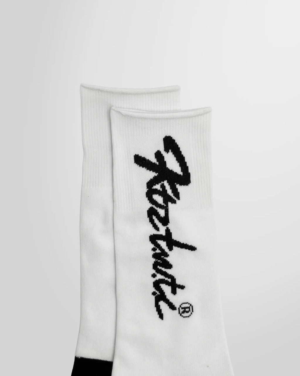 Close up view of the KTZ Logo Print Socks and the black graphic artwork
