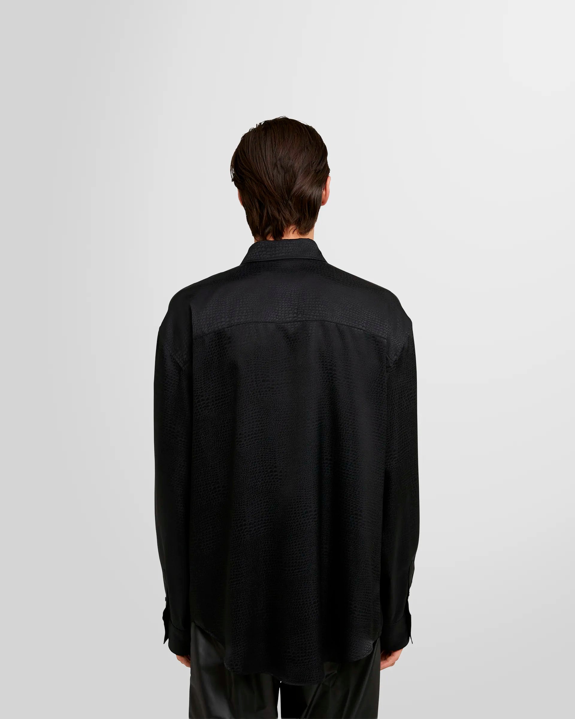 Back view of the MSGM 'Croco Satin' shirt in black.