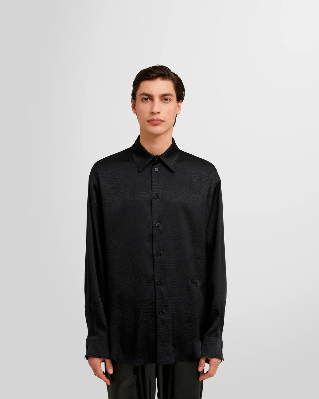 Model wearing the MSGM 'Croco Satin' shirt, showcasing its fit and drape.
