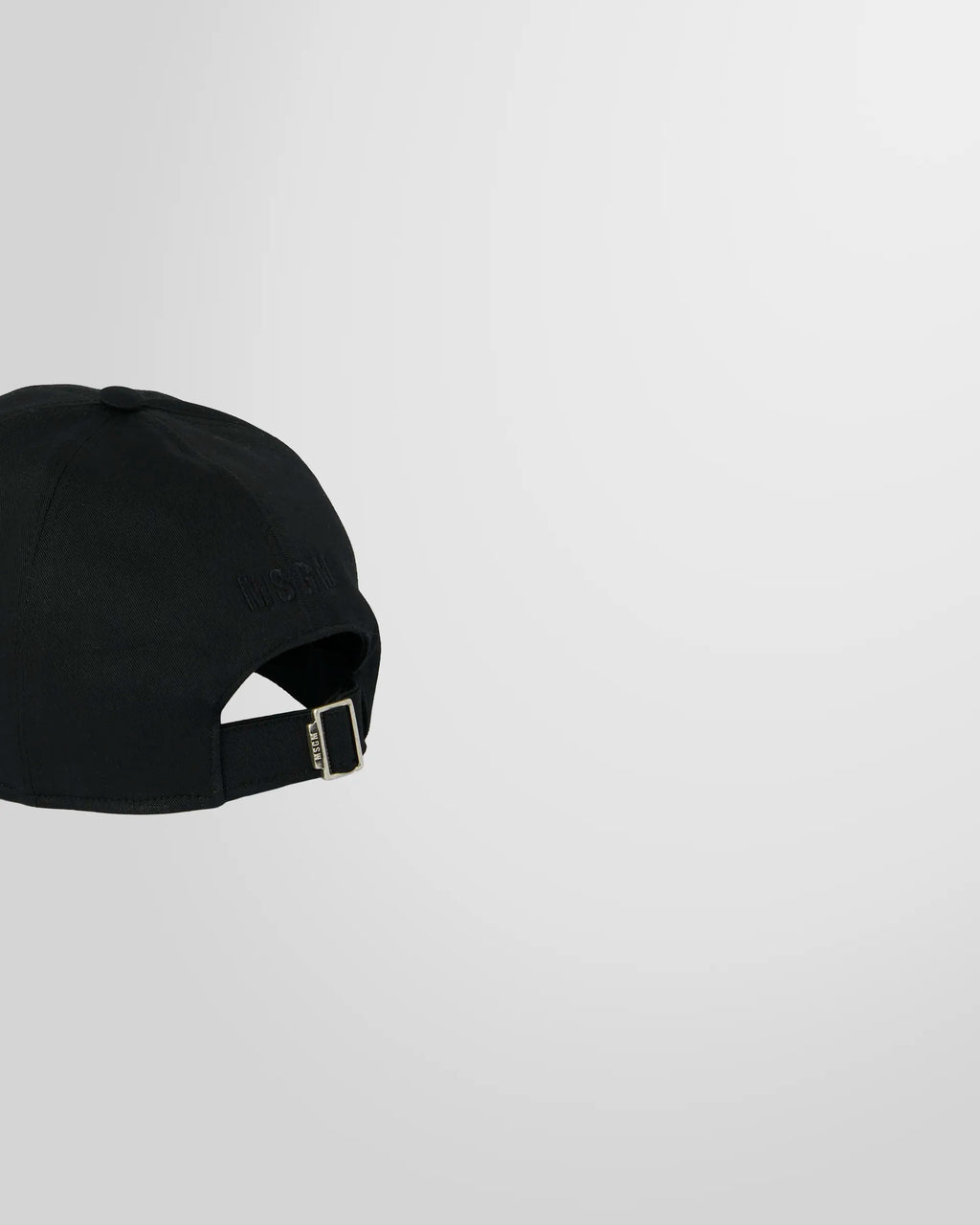 Back view of the MSGM cap, showing the adjustable strap closure.
