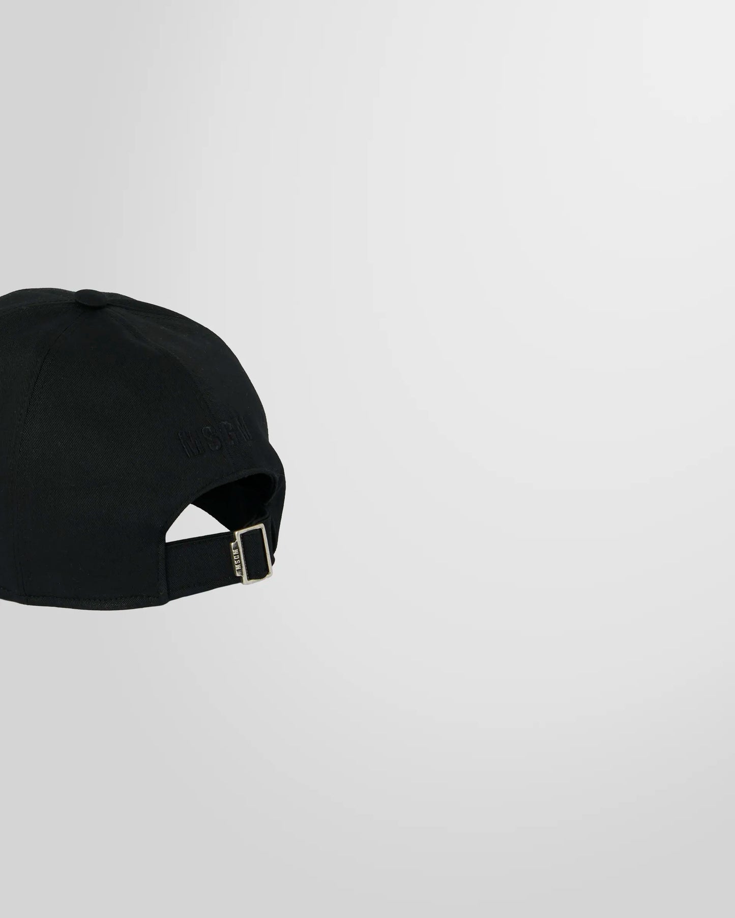 Back view of the MSGM cap, showing the adjustable strap closure.