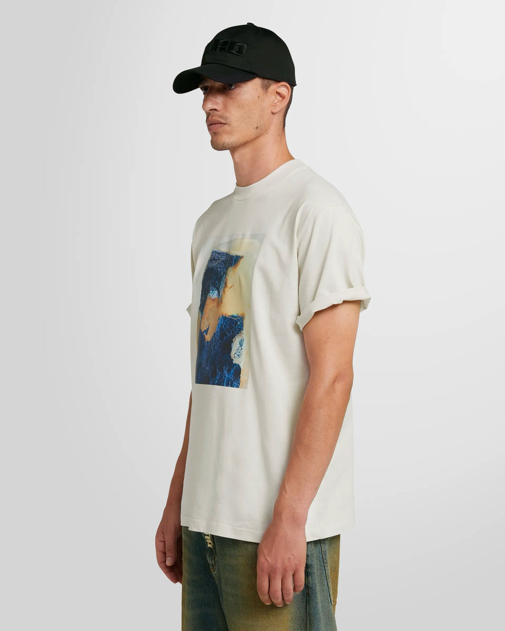 Model wearing the MSGM black cap with Duro embroidery