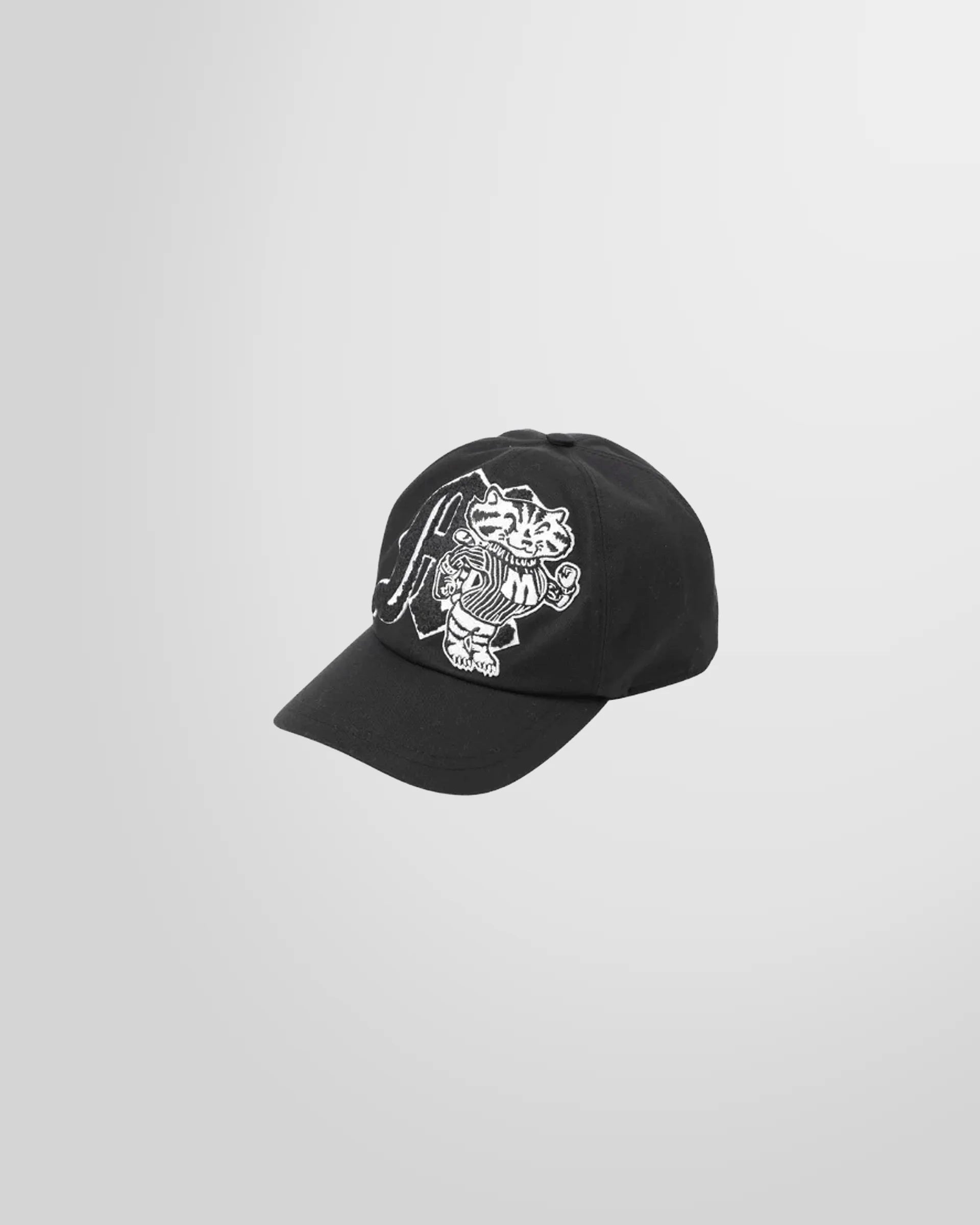 Front view of the black MSGM M Mascot cap, showing the embroidered tiger graphic.