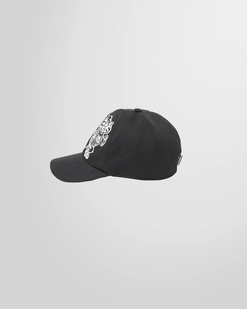 Side view of the black MSGM M Mascot cap.