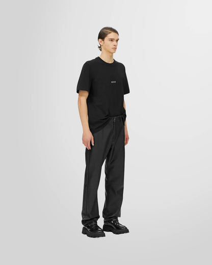 Model wearing the regular fit MSGM Micro Logo T-Shirt in black.