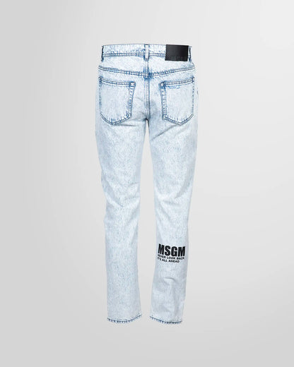 Back view of the MSGM jeans, showing the pocket placement and the subtle logo print.
