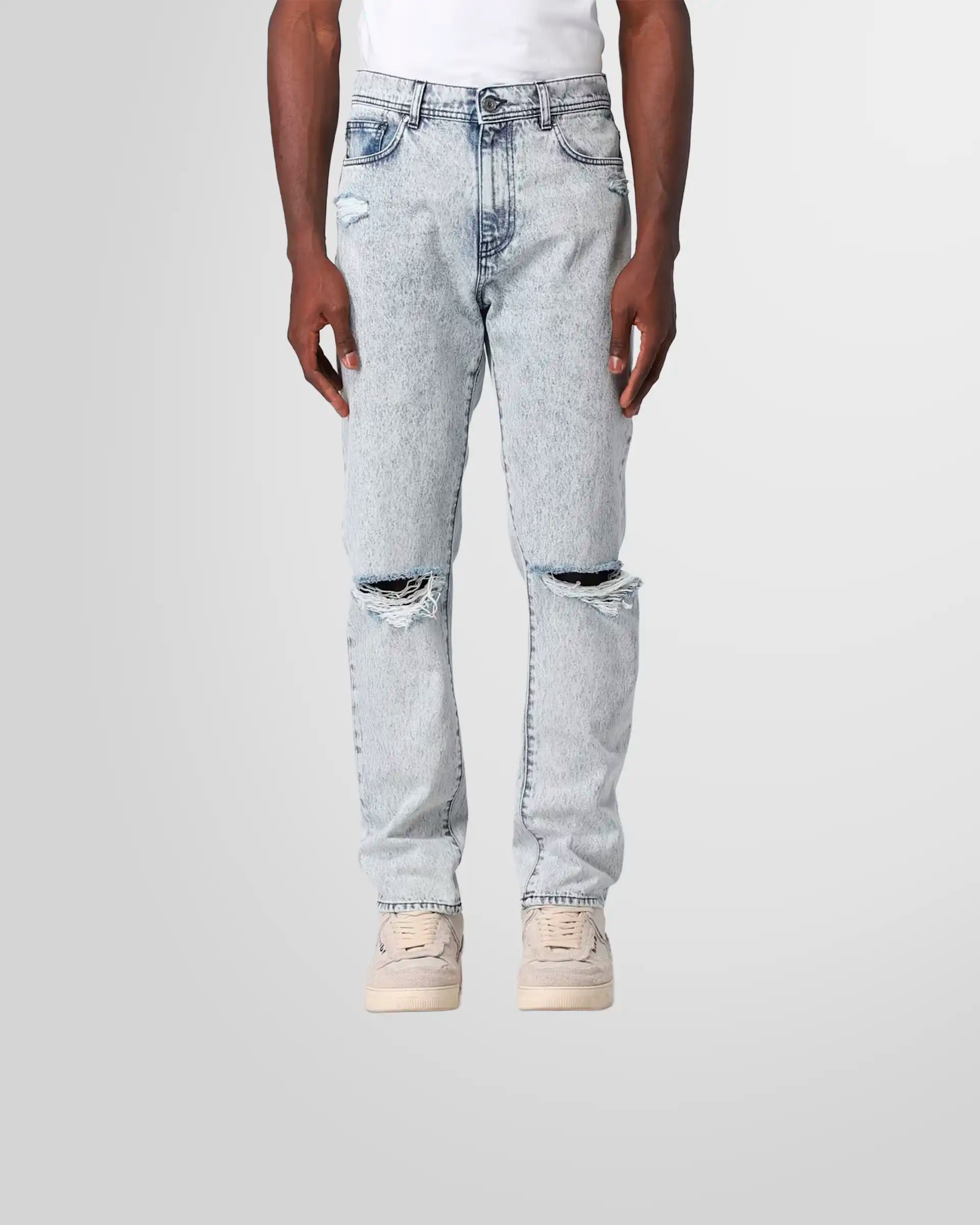 Model wearing the MSGM ripped straight-leg jeans, styled for a modern, casual look.