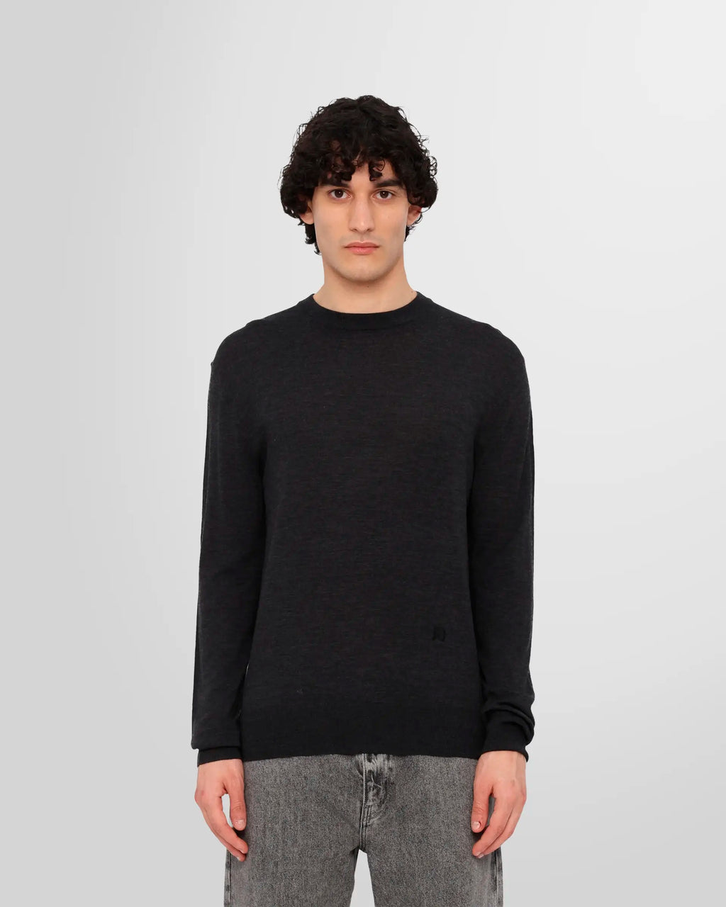 Front view of a model wearing the Nanushka Madan Fine Merino Sweater