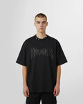 Model wearing the Black metal printed t-shirt from Not Guilty Homme.