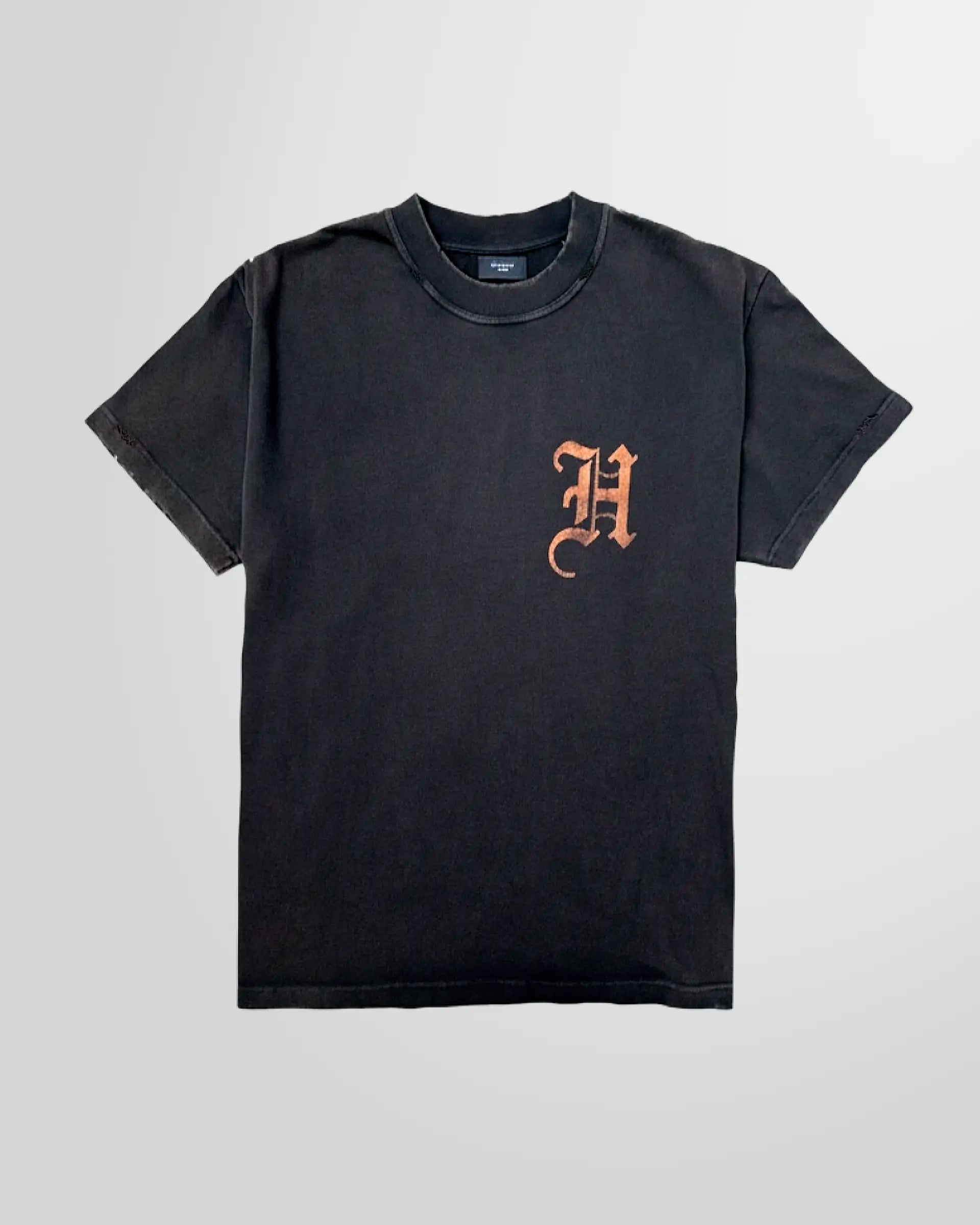 Front view of the distressed black acid‑wash t‑shirt by Not Guilty Homme.