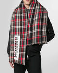 Model wearing the Not Guilty Homme red checked padded scarf.