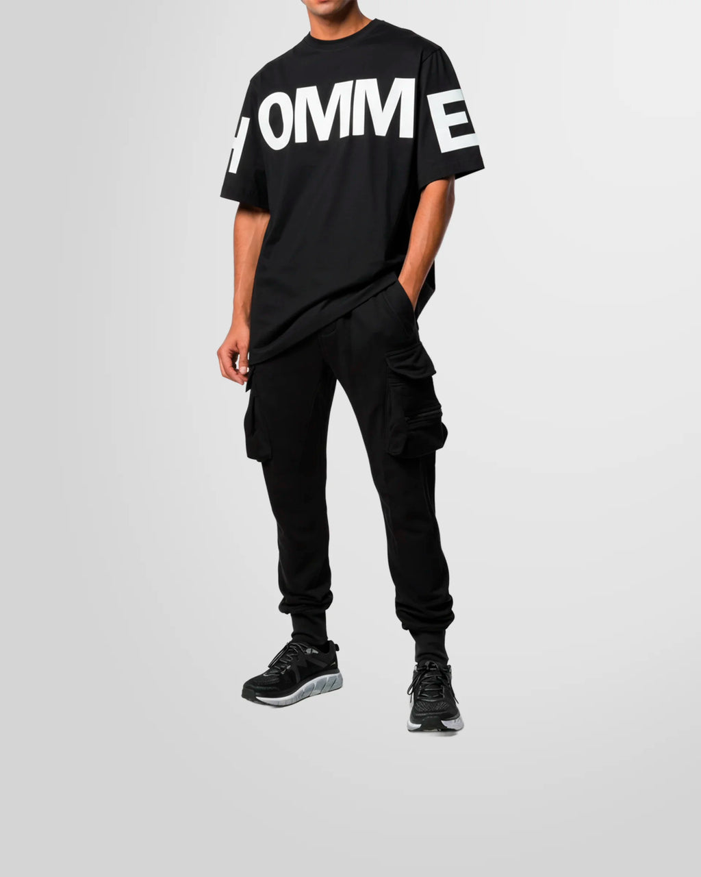 Model styled in the Not Guilty Homme contrast print t-shirt, demonstrating its bold visual impact within a contemporary fashion context.