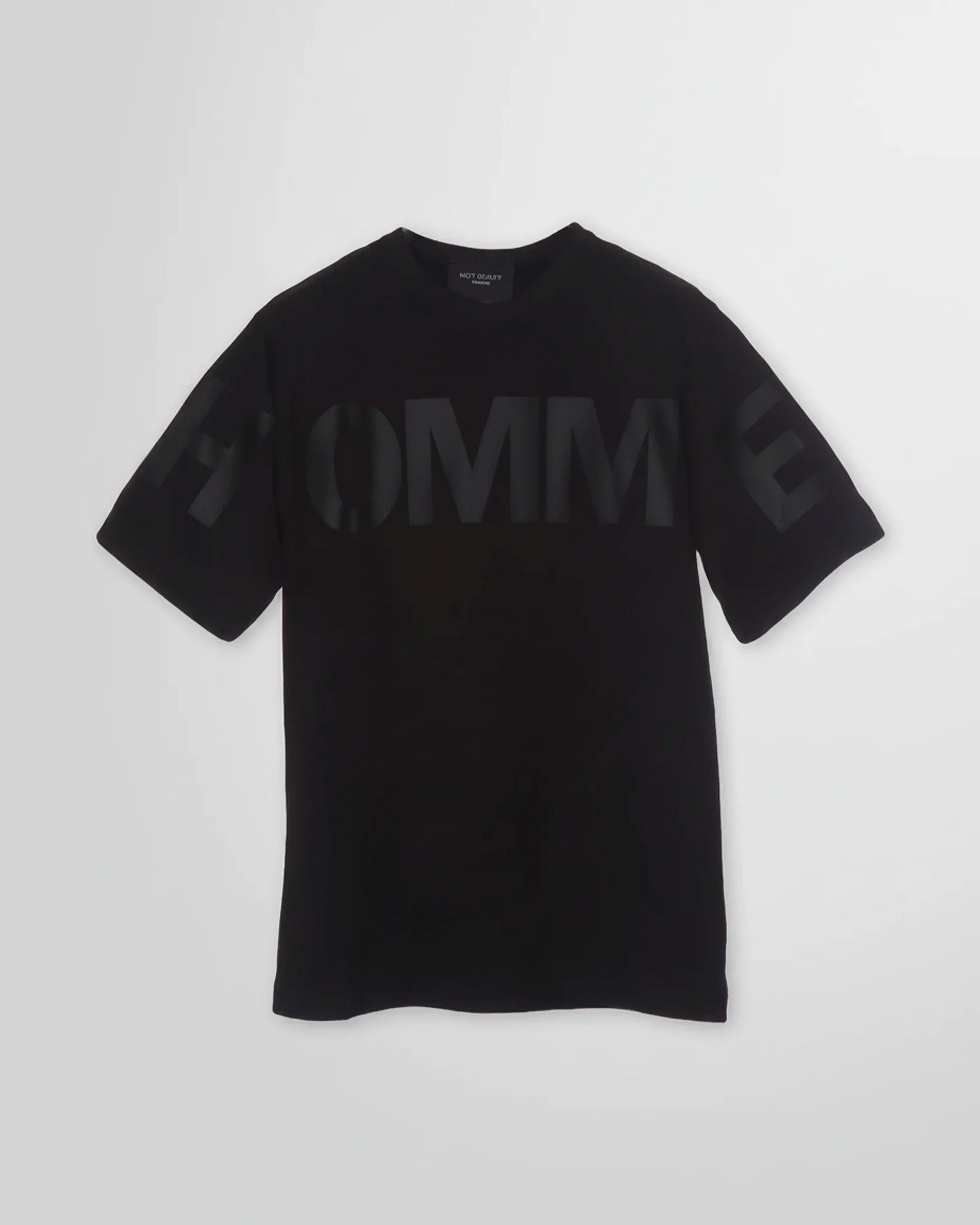 Front view of the Not Guilty Homme graphic t-shirt in black, showcasing the relaxed fit and tonal 'HOMME' print.