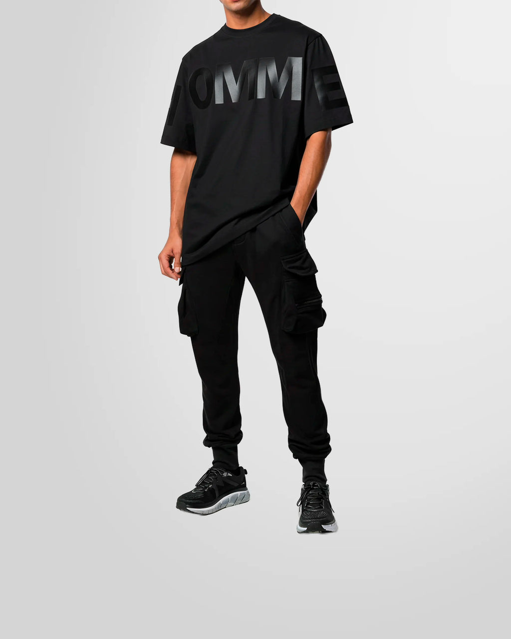 Model wearing the Not Guilty Homme graphic t-shirt black with tone on tone print