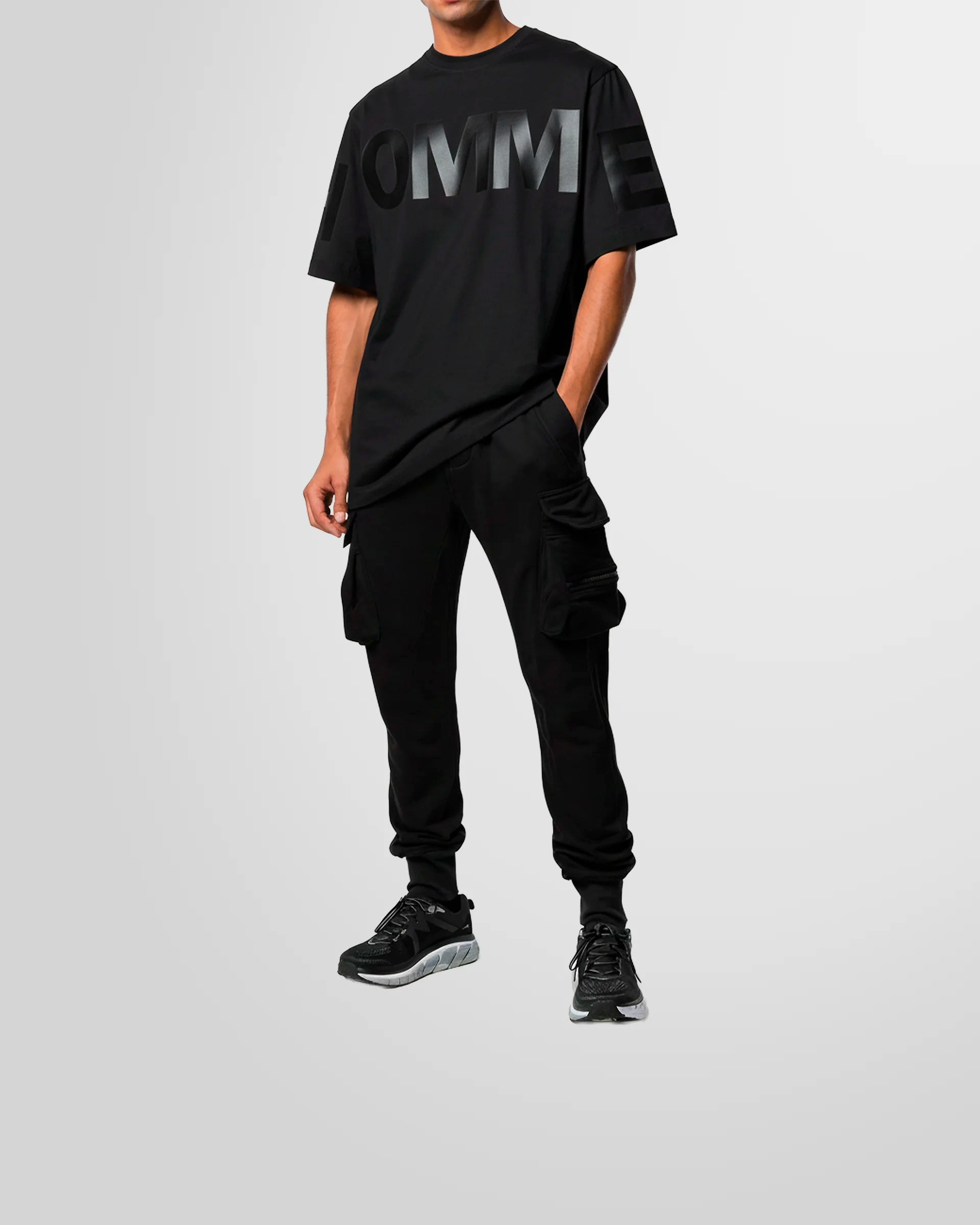 Model wearing the Not Guilty Homme graphic t-shirt black with tone on tone print