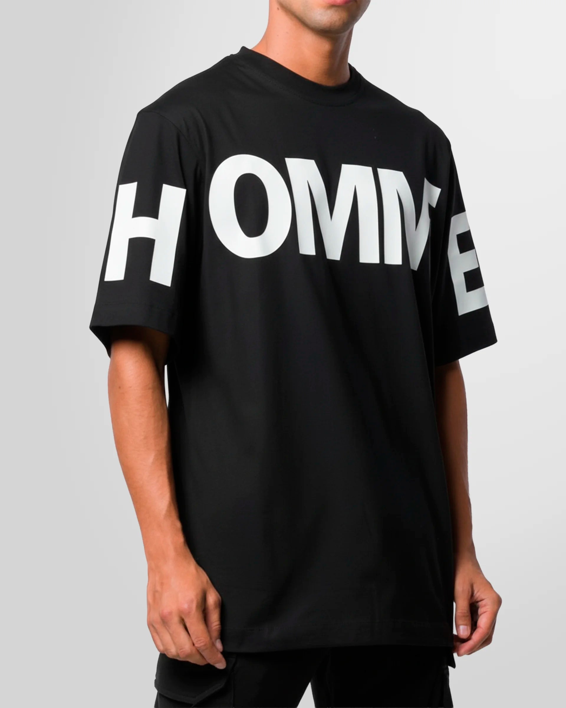 A close-up of the Not Guilty Homme t-shirt, highlighting the texture of the crisp white screen print against the fine jersey cotton.