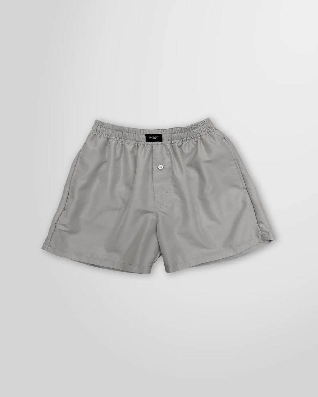 Front view of the Not Guilty Homme Grey Boxer Swim Shorts in Nylon