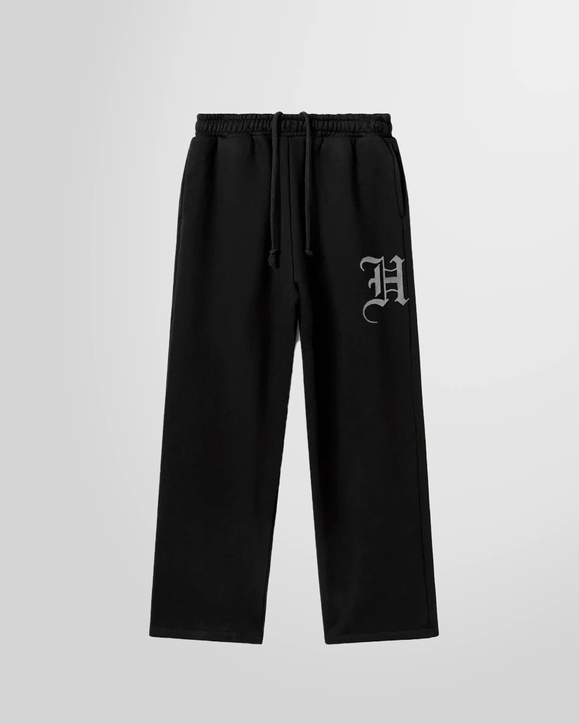 Front view of the Not Guilty Homme Initial Printed Jogging Trousers in black with thigh initial print.