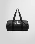 Full studio view of the Not Guilty Homme lightweight sport bag in black, showcasing its high-contrast white logo.