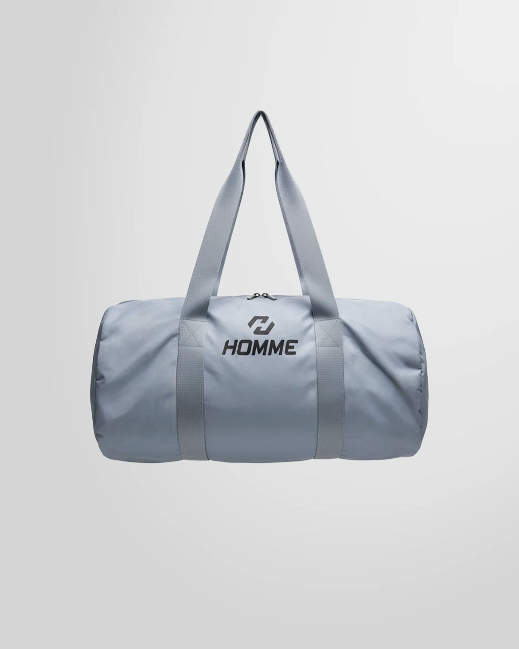Full studio view of the Not Guilty Homme lightweight sport bag in grey, showcasing its minimalist design.