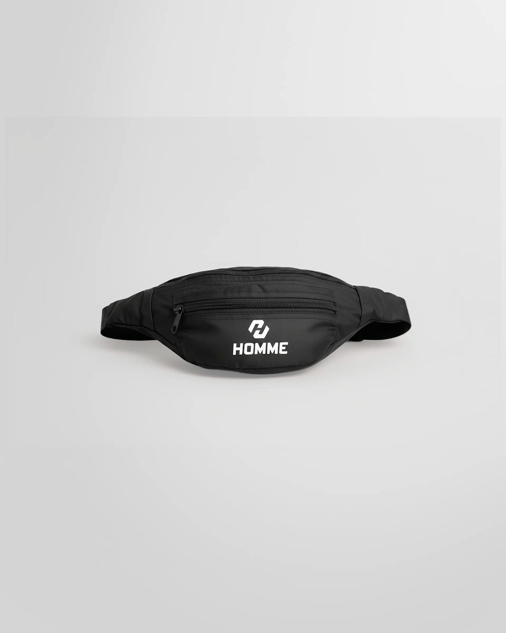 Front view of the Not Guilty Homme technical belt bag in black lightweight nylon.